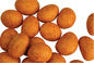 Las vitaminas curruscantes cubiertas rojas del gusto de los cacahuetes de Cajun contuvieron las materias primas sanas