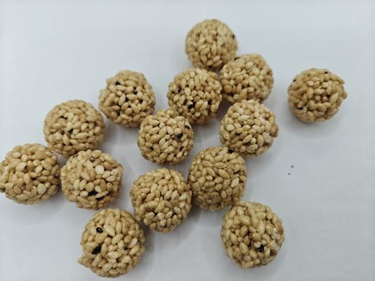Paquetes a granel de bolas de arroz con frutos secos y alto contenido de proteínas, origen del país