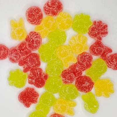 Golosinas de goma con forma divertida y color mezclado, infusionadas con fruta y recubiertas de azúcar