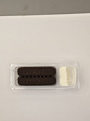 Crujientes con salsa de crema de leche con 35% de sólidos de leche y envasado en compartimentos - Mezcla de aperitivos saludables reducida en lactosa