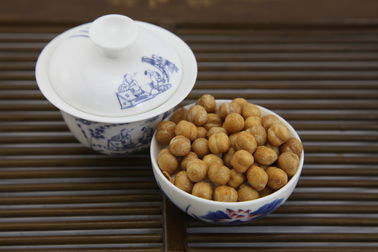 El bocado asado Wasabi bajo en grasa de los garbanzos, los garbanzos cocidos crujientes texturiza difícilmente