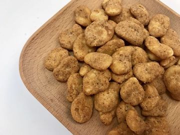 Las habas revestidas bocado, vitaminas contuvieron las patatas a la inglesa de la haba que restauraban gusto