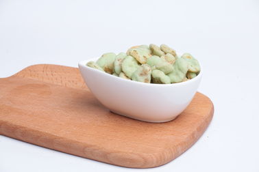 Curruscantes revestidos del sabor del Wasabi secan la muestra de alimentos asada de bocado de las habas disponible